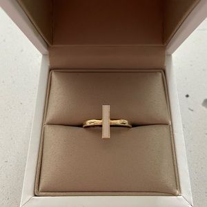 Gold plated ring with white accent